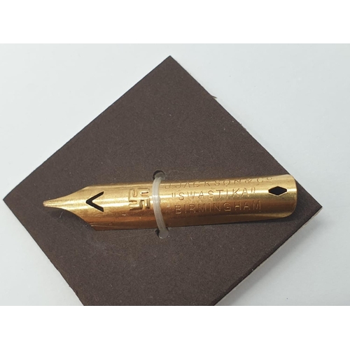 197 - A 19th Century piece of hand writing history: a heavily gilt pen nib with an oblique point, engraved... 