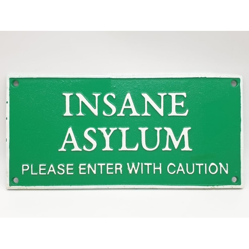 84 - A cast iron sign reading INSANE ASYLUM. Dimensions: 27 x 13 cm.