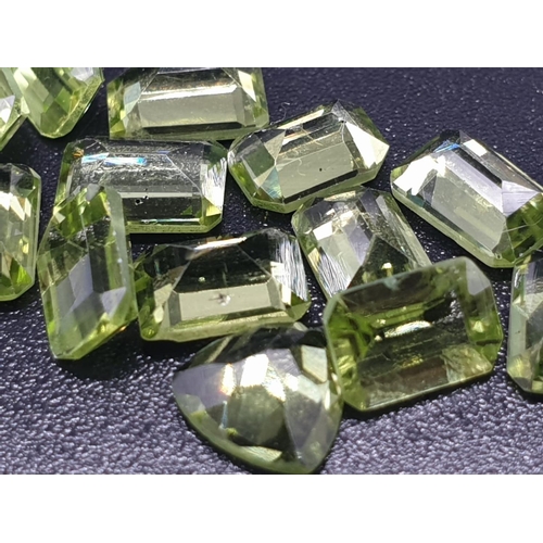 999 - 9 Cts assorted PERIDOT GEMSTONES. Rectangular step cut, Calibrated