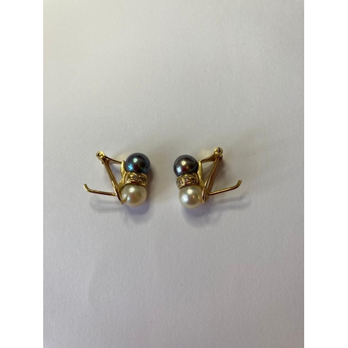 57 - 18ct Gold Diamond and Pearl EARRINGS.  Having Diamonds set in Gold to centre with Pearls either side... 