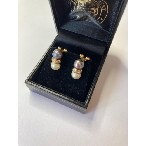 57 - 18ct Gold Diamond and Pearl EARRINGS.  Having Diamonds set in Gold to centre with Pearls either side... 