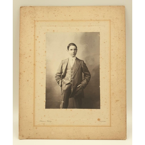 309 - From the studio of Clarence Hailey come two photographs of young men (possibly jockeys). Photos 10x1... 