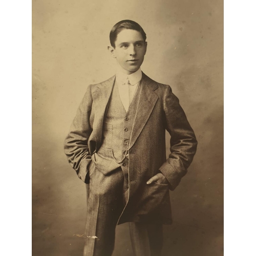 309 - From the studio of Clarence Hailey come two photographs of young men (possibly jockeys). Photos 10x1... 