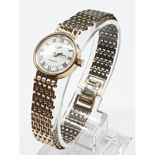 49 - Everite Ladies 9ct Gold Wristwatch with 9ct Gold Strap and Quartz movement.  F.W.O.     16g