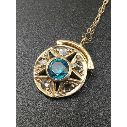 229 - 14ct Gold PENDANT with a blue CZ centre and Rose cut Diamond and 9ct Gold CHAIN.   2.68g   42cm long... 