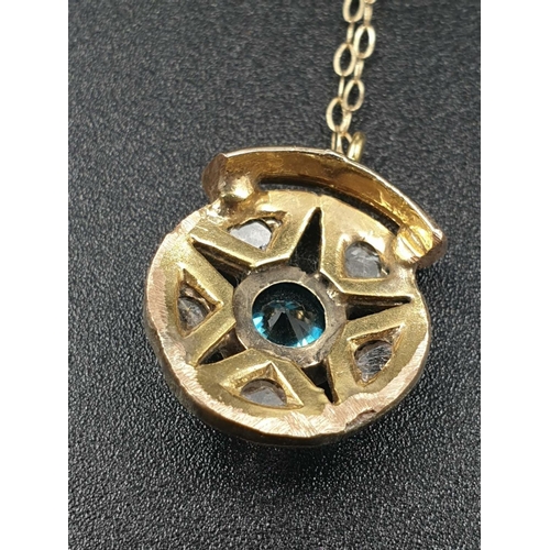 229 - 14ct Gold PENDANT with a blue CZ centre and Rose cut Diamond and 9ct Gold CHAIN.   2.68g   42cm long... 