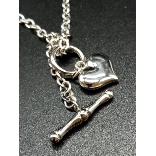 79 - 9ct white gold chain and heart pendant. Weighs 5g and aprox 45cm long.