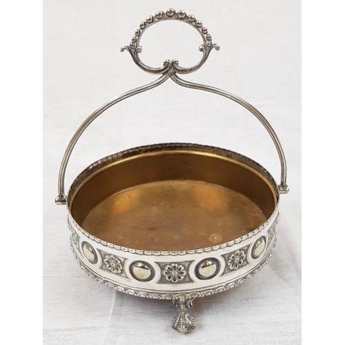 187 - An Antique Silver Bon Bon Dish with Handle. Removable Brass Inlet. Floral design around circular edg... 