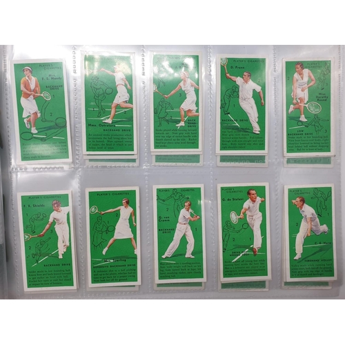 198 - Set of 50, 1936 John Player & Sons, tennis players in action cards (adhesive). Encapsulated in plast... 