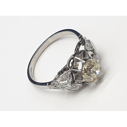 167 - Platinum Old cut Diamond RING with approx 0.5 diamond centre and further diamond settings on the sho... 