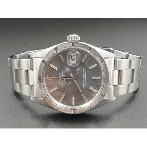 14 - Rolex Stainless Steel Oyster Perpetual WATCH with date box and Silver face.  32mm