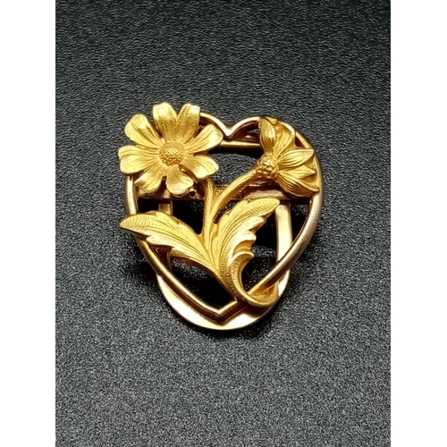 570 - Yellow Metal French CLIP in floral design.  1.8g   1.7cm