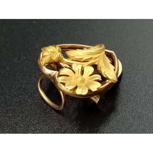 570 - Yellow Metal French CLIP in floral design.  1.8g   1.7cm