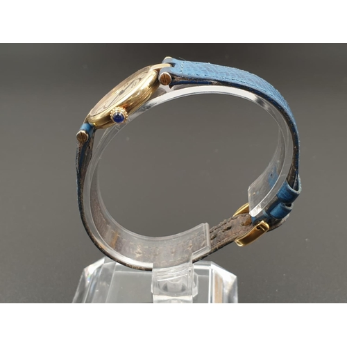 35 - Cartier Quartz Ladies WATCH. Gold plated on Silver with Roman Numerals and Blue Leather Strap.    24... 