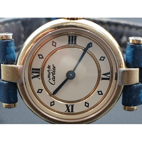 35 - Cartier Quartz Ladies WATCH. Gold plated on Silver with Roman Numerals and Blue Leather Strap.    24... 