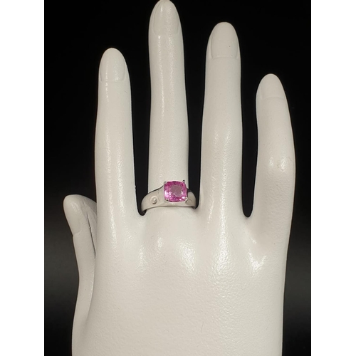 18 - 18ct White Gold RING with a 1.9ct Pink Sapphire.  5.9g   Size: O.  Comes with Certified Gem and Jewe... 