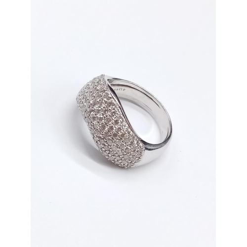 137 - 18ct White Gold RING with encrusted Diamond face.  Modern design.  13.1g     Size: U