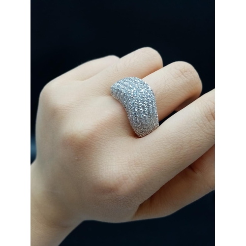 137 - 18ct White Gold RING with encrusted Diamond face.  Modern design.  13.1g     Size: U