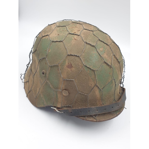 36 - 100% Original German M35 Helmet in Normandy Cam. The textured paint work appears to be of the period... 