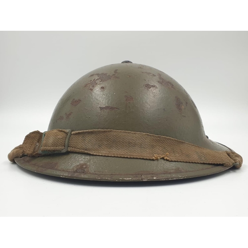 19 - WW2 British Brodie Helmet with insignia of the Highland Division.