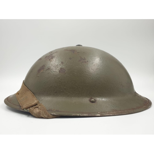 19 - WW2 British Brodie Helmet with insignia of the Highland Division.