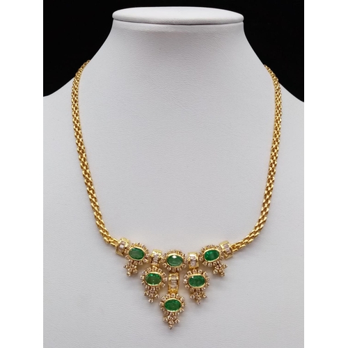 102 - 21ct Yellow Gold NECKLACE with Diamonds and Emeralds.  36cm in total.   32.1g.