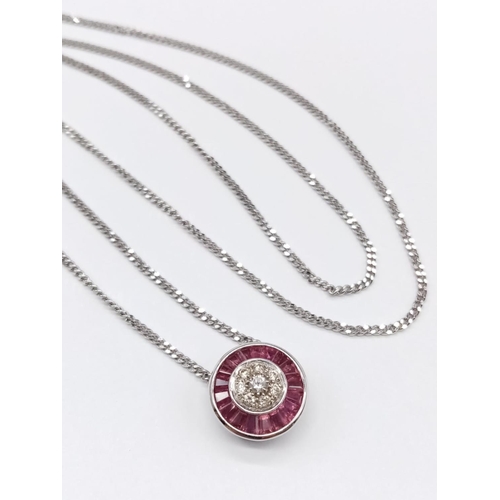 68 - Diamond and Ruby circular PENDANT on a 9ct White Gold CHAIN.   5.4g      54cm  chain