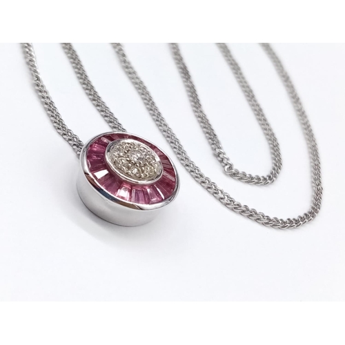 68 - Diamond and Ruby circular PENDANT on a 9ct White Gold CHAIN.   5.4g      54cm  chain