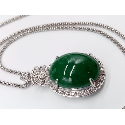 116 - 18ct White Gold and Diamond PENDANT  with Emerald Cabochon Stone on a 46cm 18ct Gold CHAIN.   12.1g