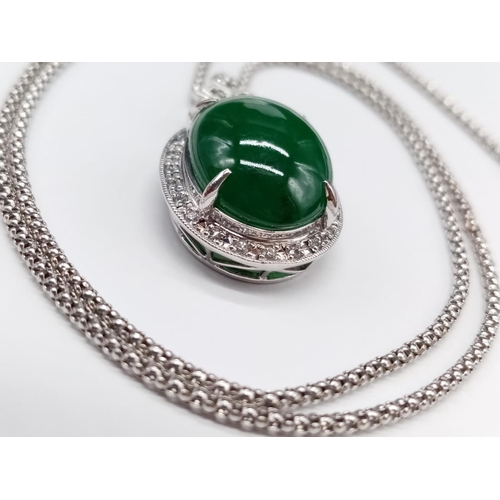 116 - 18ct White Gold and Diamond PENDANT  with Emerald Cabochon Stone on a 46cm 18ct Gold CHAIN.   12.1g