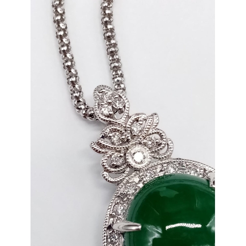 116 - 18ct White Gold and Diamond PENDANT  with Emerald Cabochon Stone on a 46cm 18ct Gold CHAIN.   12.1g