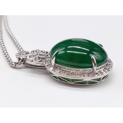 116 - 18ct White Gold and Diamond PENDANT  with Emerald Cabochon Stone on a 46cm 18ct Gold CHAIN.   12.1g