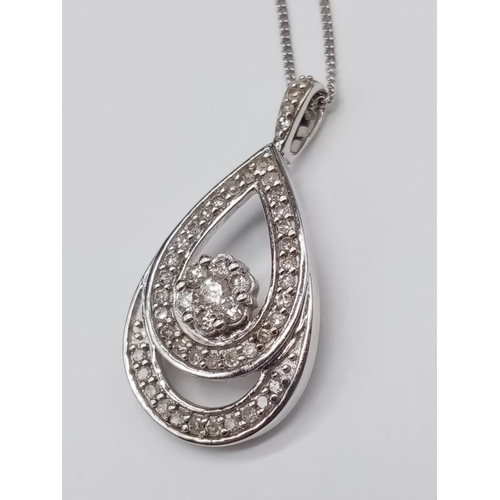 128 - 9K diamond pendant and chain. Approx 44cm. 2.55g