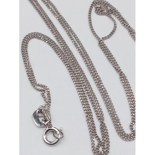 128 - 9K diamond pendant and chain. Approx 44cm. 2.55g