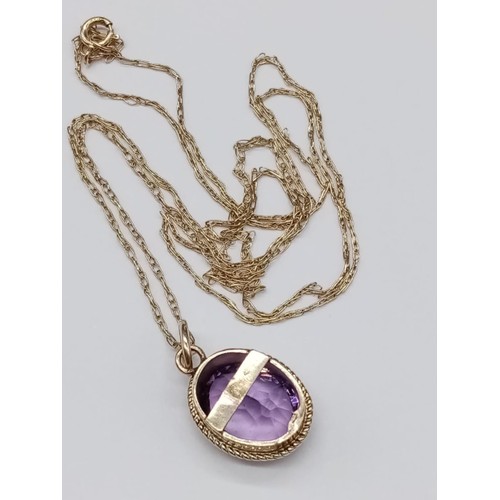 566 - Amethyst PENDANT set in 9ct Gold on a 9ct Gold CHAIN.   2.16g     50cm long.