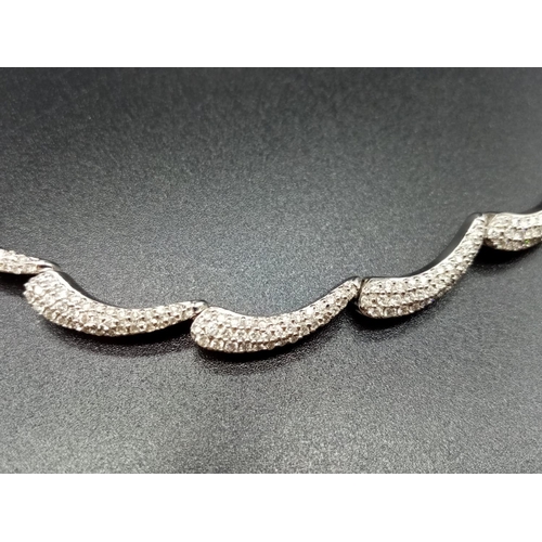 207 - 18ct White Gold Articulated NECKLACE with Diamond encrusting.  29.8g         48cm