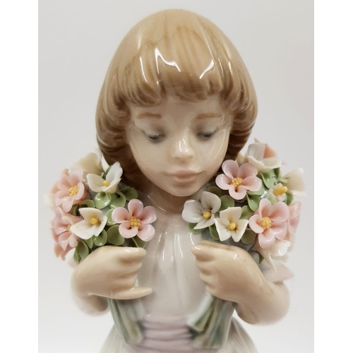 185 - Lladro Porcelain Figure - Girl with Spring Bouquets of Flowers. 1987. 21cm high.