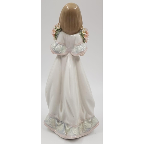 185 - Lladro Porcelain Figure - Girl with Spring Bouquets of Flowers. 1987. 21cm high.