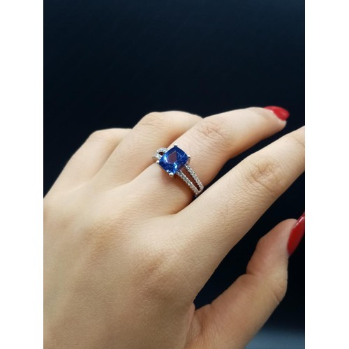 188 - 18ct White Gold Tanzanite RING with a large Tanzanite centre and encrusted Diamonds on the shoulders... 