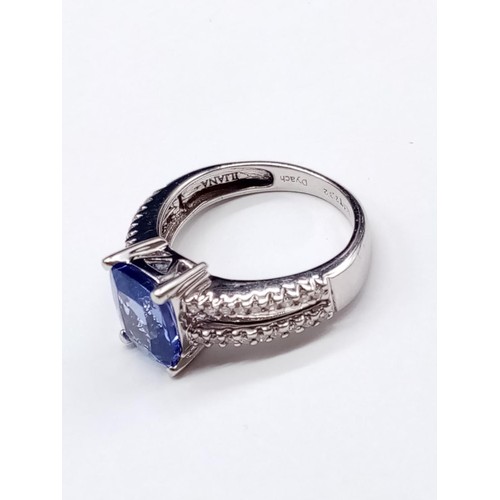 188 - 18ct White Gold Tanzanite RING with a large Tanzanite centre and encrusted Diamonds on the shoulders... 