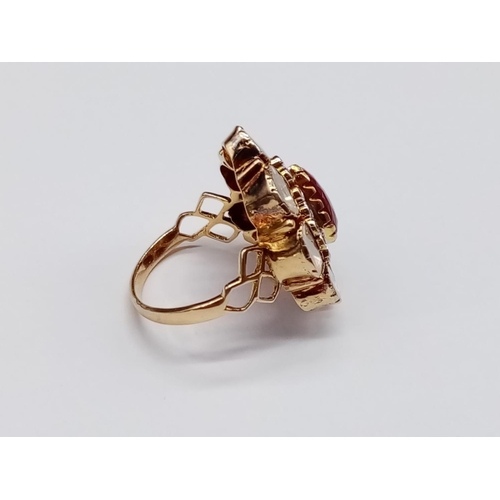 177 - Antique Yellow Gold RING with a pear-shaped Ruby centre surrounded by Rose cut Diamonds.   (Approx o... 