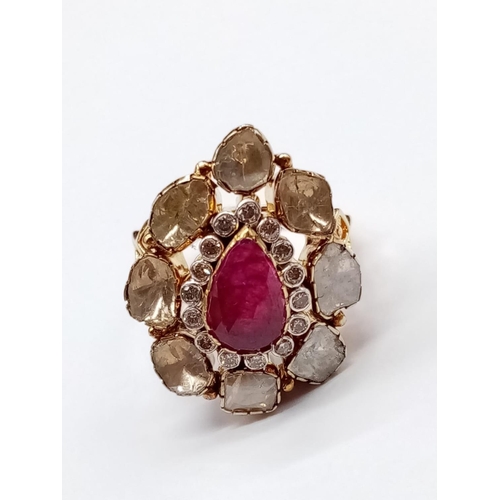 177 - Antique Yellow Gold RING with a pear-shaped Ruby centre surrounded by Rose cut Diamonds.   (Approx o... 