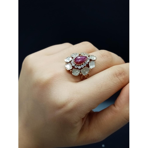 177 - Antique Yellow Gold RING with a pear-shaped Ruby centre surrounded by Rose cut Diamonds.   (Approx o... 