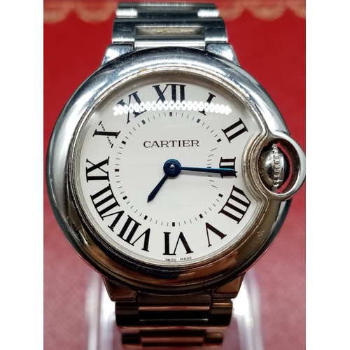 42 - Cartier Stainless Steel Ladies WATCH with Roman Numerals and white face.  Stainless Steel Strap.  Co... 