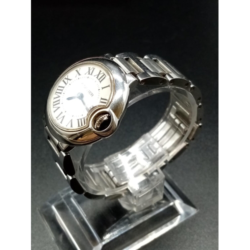 42 - Cartier Stainless Steel Ladies WATCH with Roman Numerals and white face.  Stainless Steel Strap.  Co... 