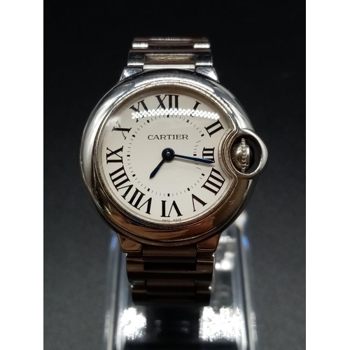 42 - Cartier Stainless Steel Ladies WATCH with Roman Numerals and white face.  Stainless Steel Strap.  Co... 