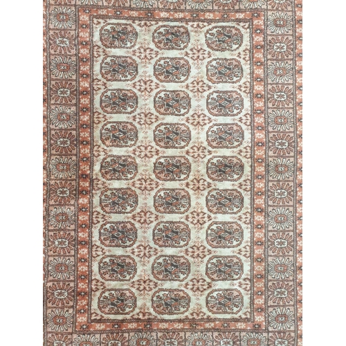 155 - Small Chinese silk rug. 106x67cm with fringed ends.