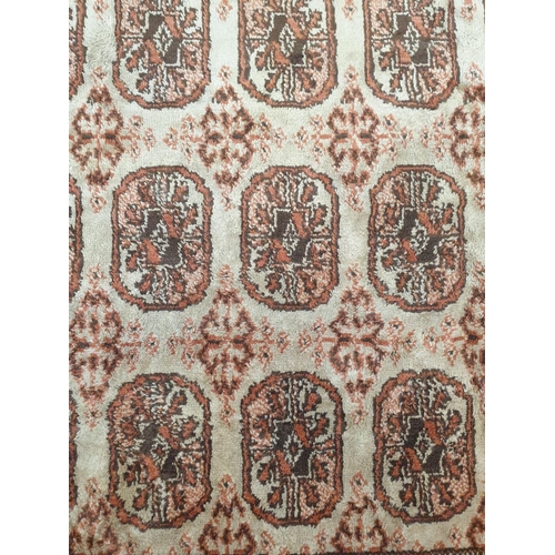 155 - Small Chinese silk rug. 106x67cm with fringed ends.