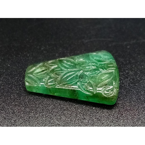 561 - 10.050 Cts Natural Carved Irregular Shape Emerald.  GLI Certified