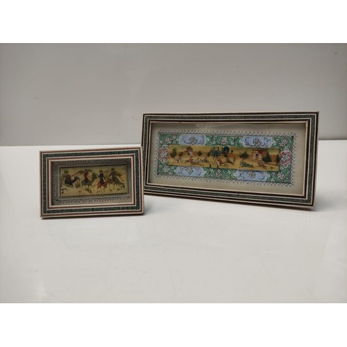 837 - 2 different size frames containing very early hand paintings on some form of bone strip, later frame... 